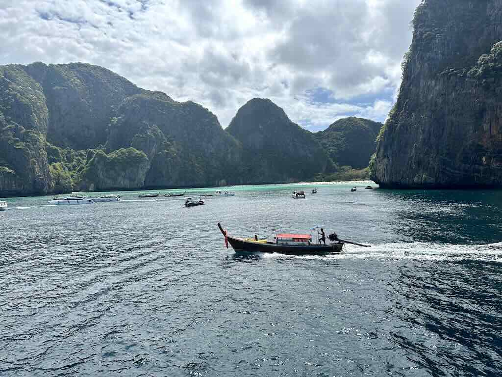 Maya Bay beach seen from a boat approaching Koh Phi Phi, Thailand
