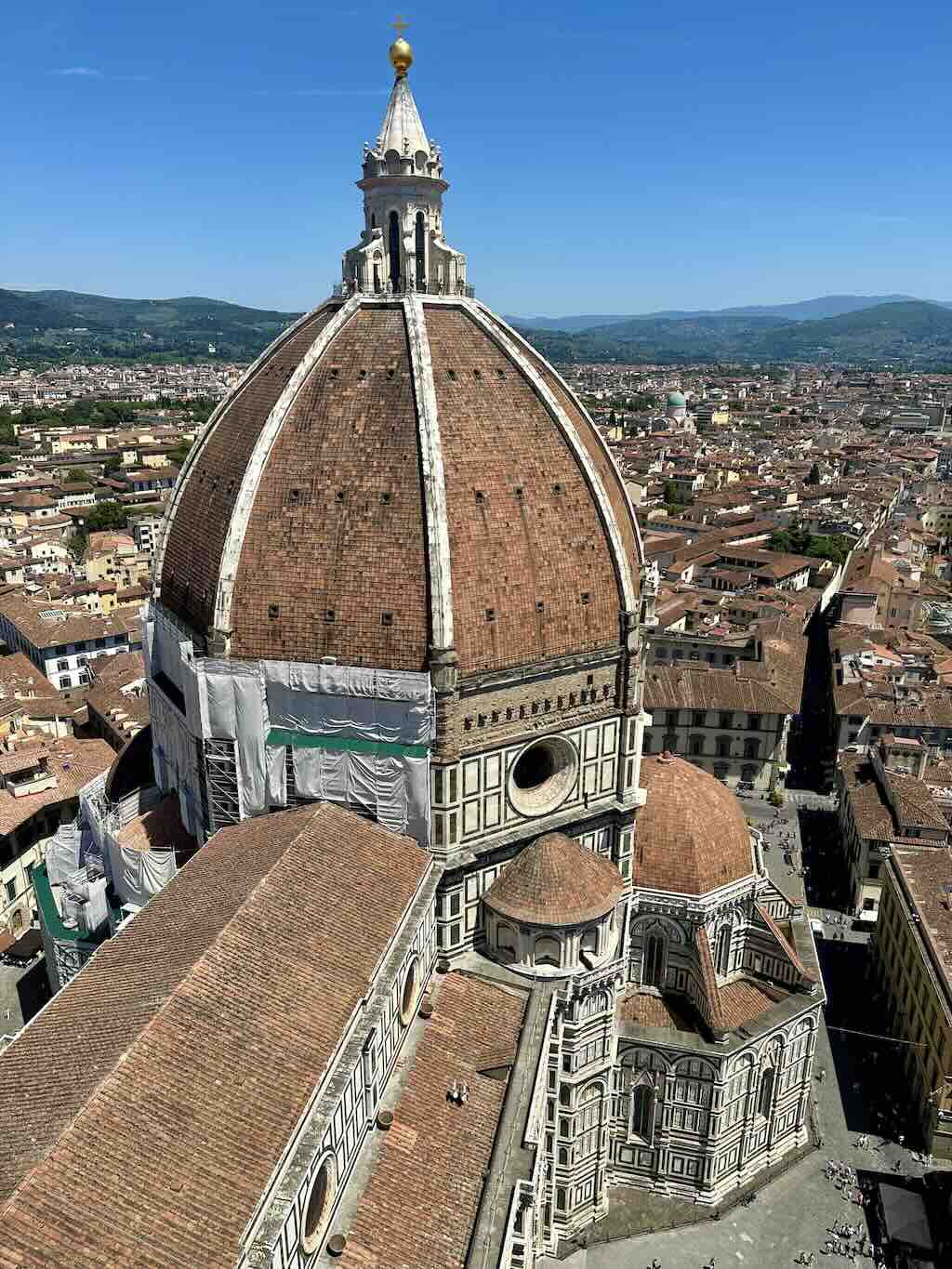 The Duomo and the rooftops of Florence seen from the bell tower