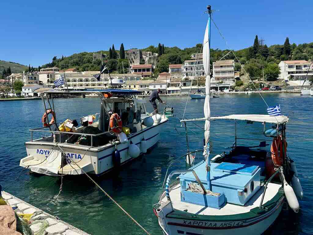 Kassiopi port Corfu Greece fishing boats harbor village