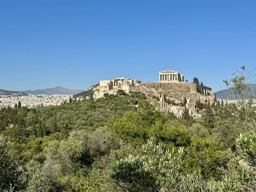Acropolis of Athens view from Philopappos Hill at sunset with Parthenon