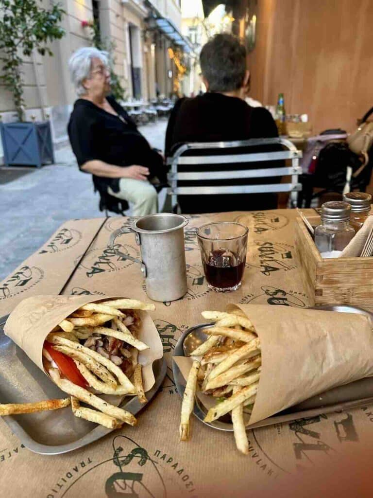 Gyros pita street food in Athens served with fries at a local restaurant