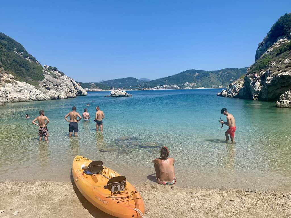 Yellow kayak on the shore of Porto Timoni with crystal-clear water, Corfu