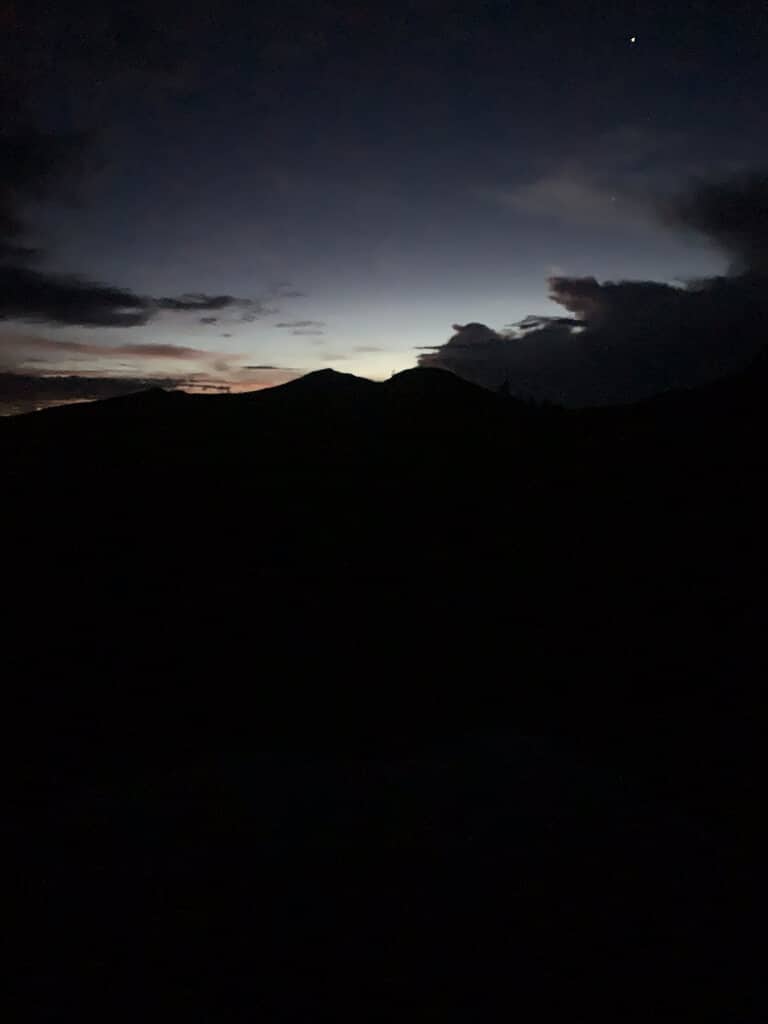 First light over the ridge of Kelimutu before sunrise