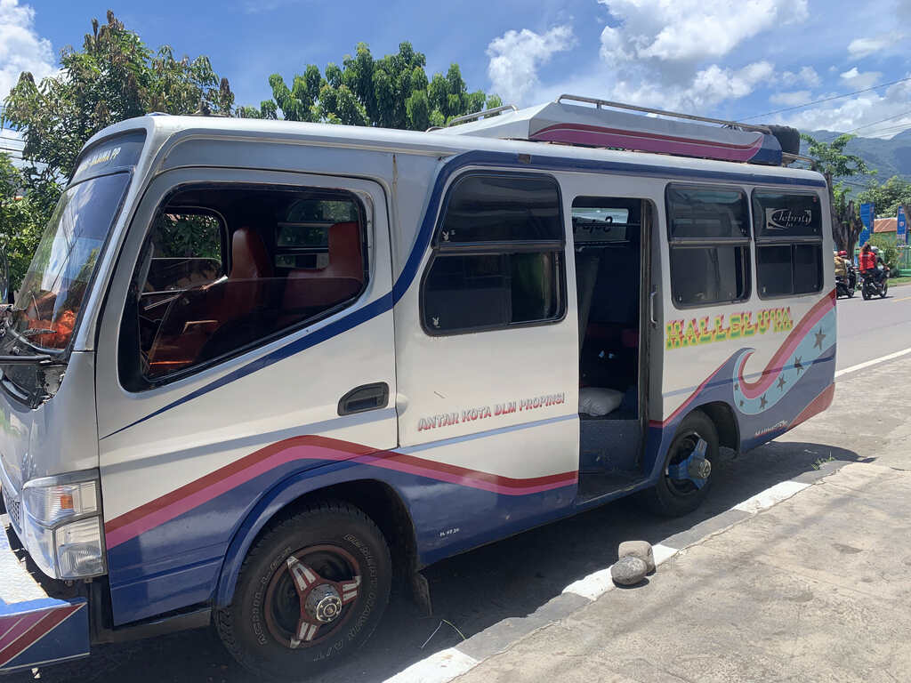 A local wooden truck-bus, one way to reach Moni on Flores