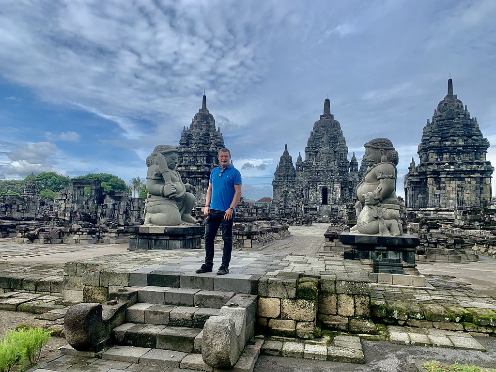 Blaise Jaeger standing among the temple ruins of Candi Sewu in the Prambanan complex, Java, Indonesia