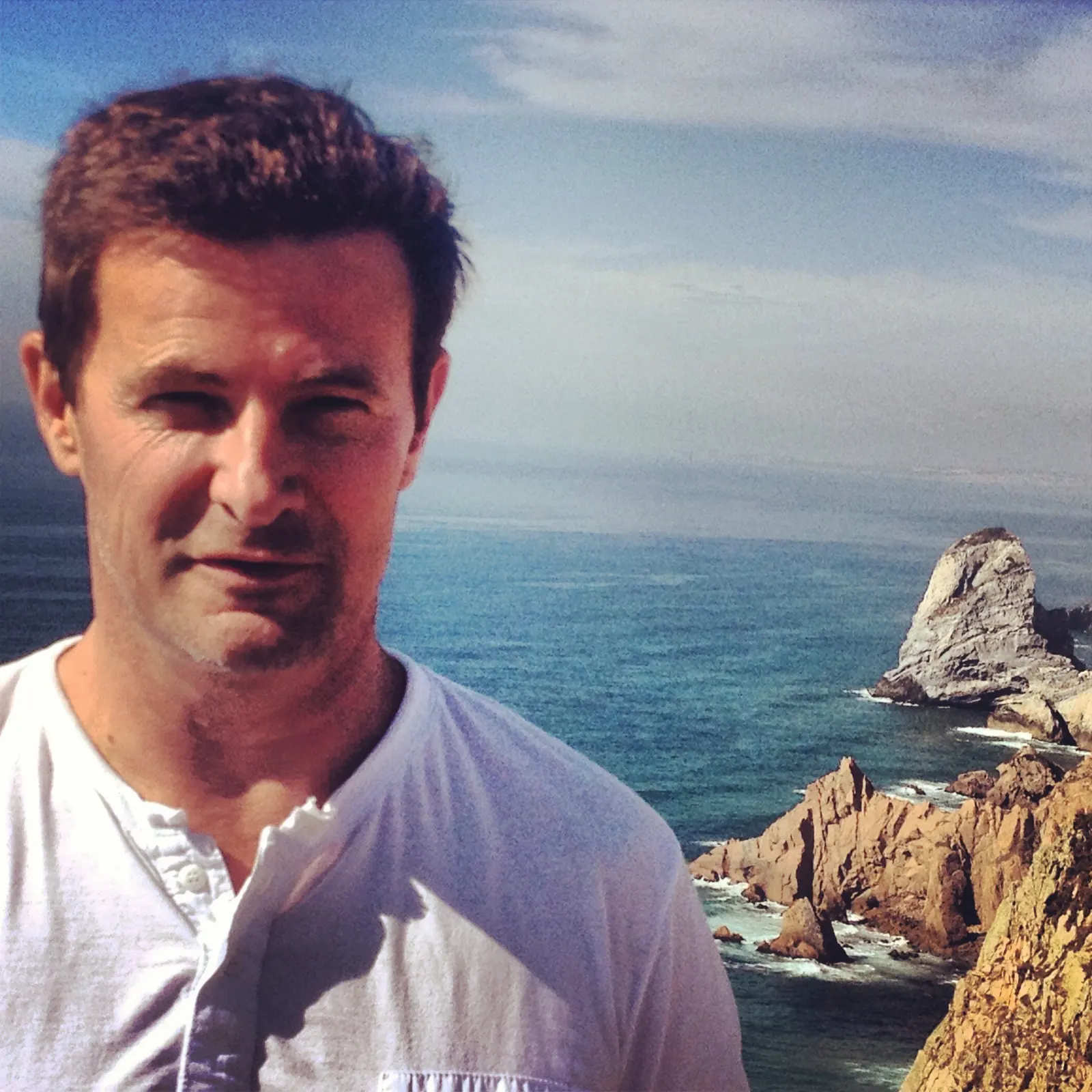 Blaise Jaeger at Cabo da Roca with the Atlantic cliffs behind