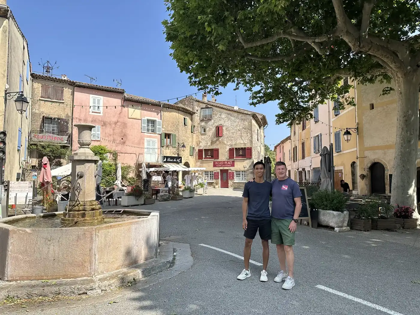 Blaise Jaeger and Roy by the fountain of Tourtour