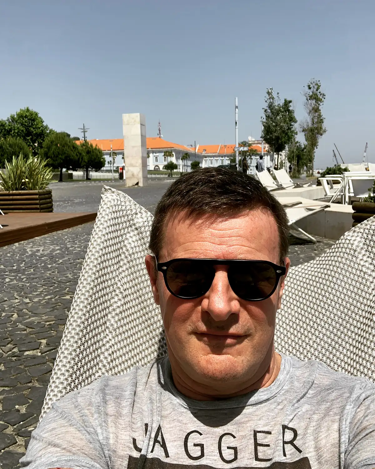 Blaise Jaeger relaxing in a deckchair on the Tagus riverside in Lisbon