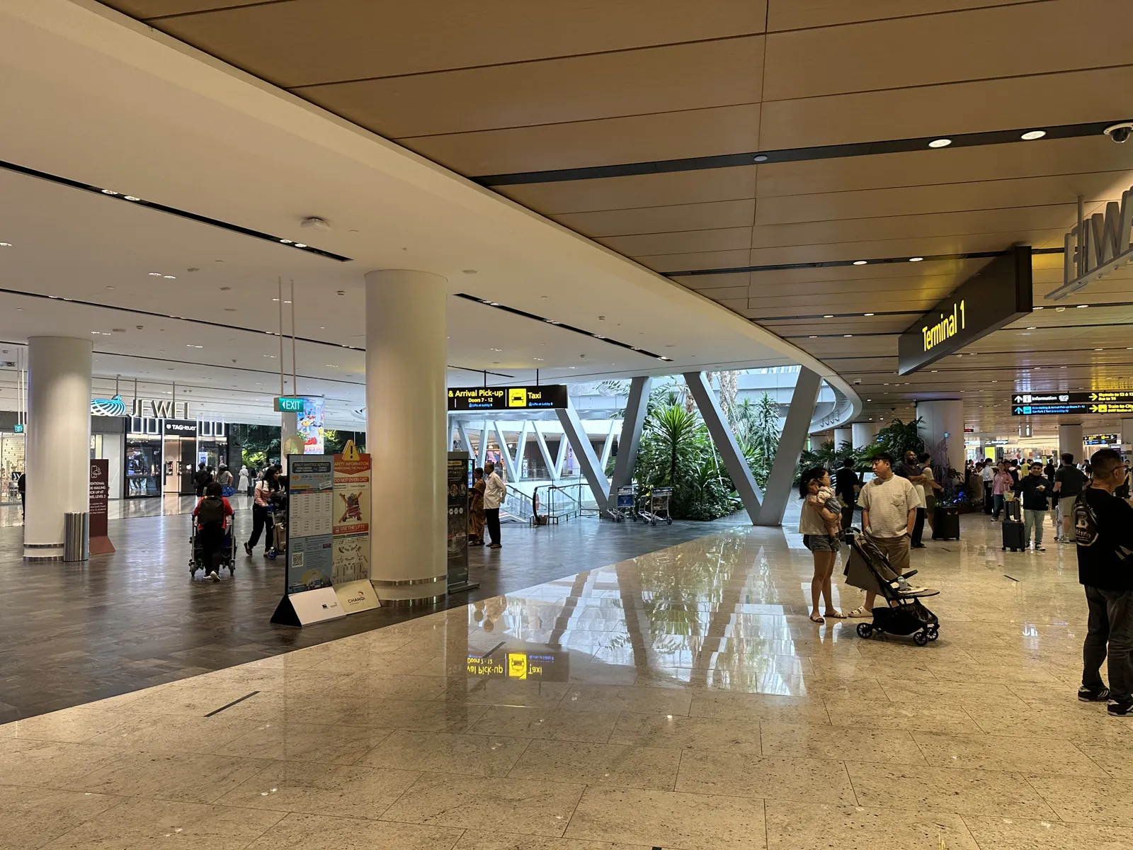 Doorgang tussen Jewel en de aankomsthal van Terminal 1 op Changi Airport