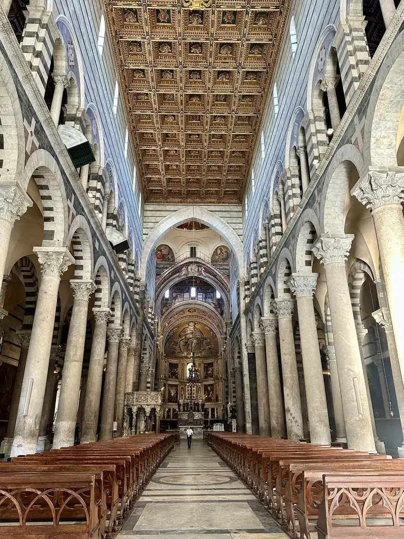 The nave and coffered ceiling inside Pisa Cathedral
