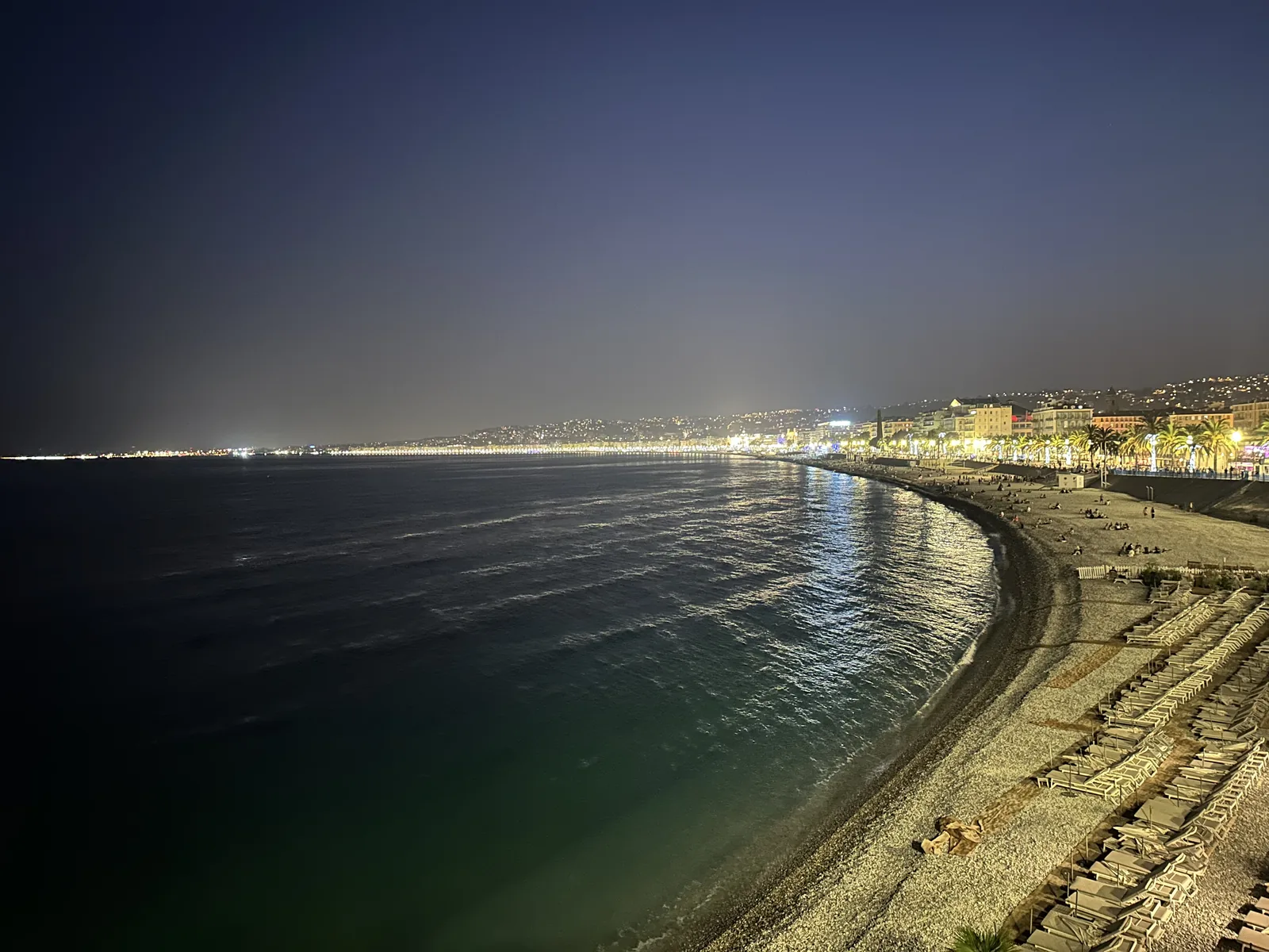 The Baie des Anges and the lights of the Promenade des Anglais in Nice at night