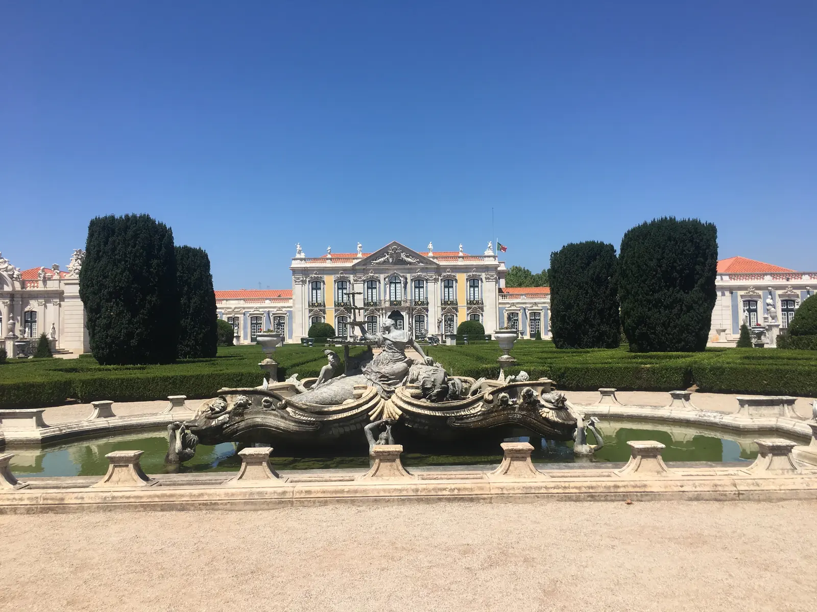 The facade and formal gardens of the National Palace of Queluz