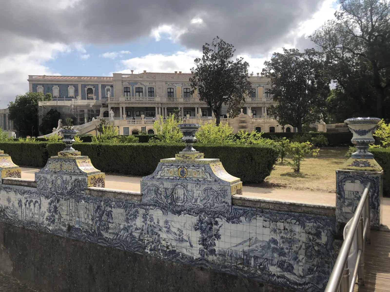 The canal lined with blue and white azulejos in the gardens of the Palace of Queluz