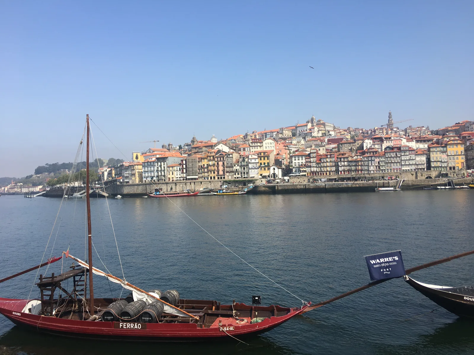 Traditional rabelo boats on the Douro in front of the Ribeira of Porto