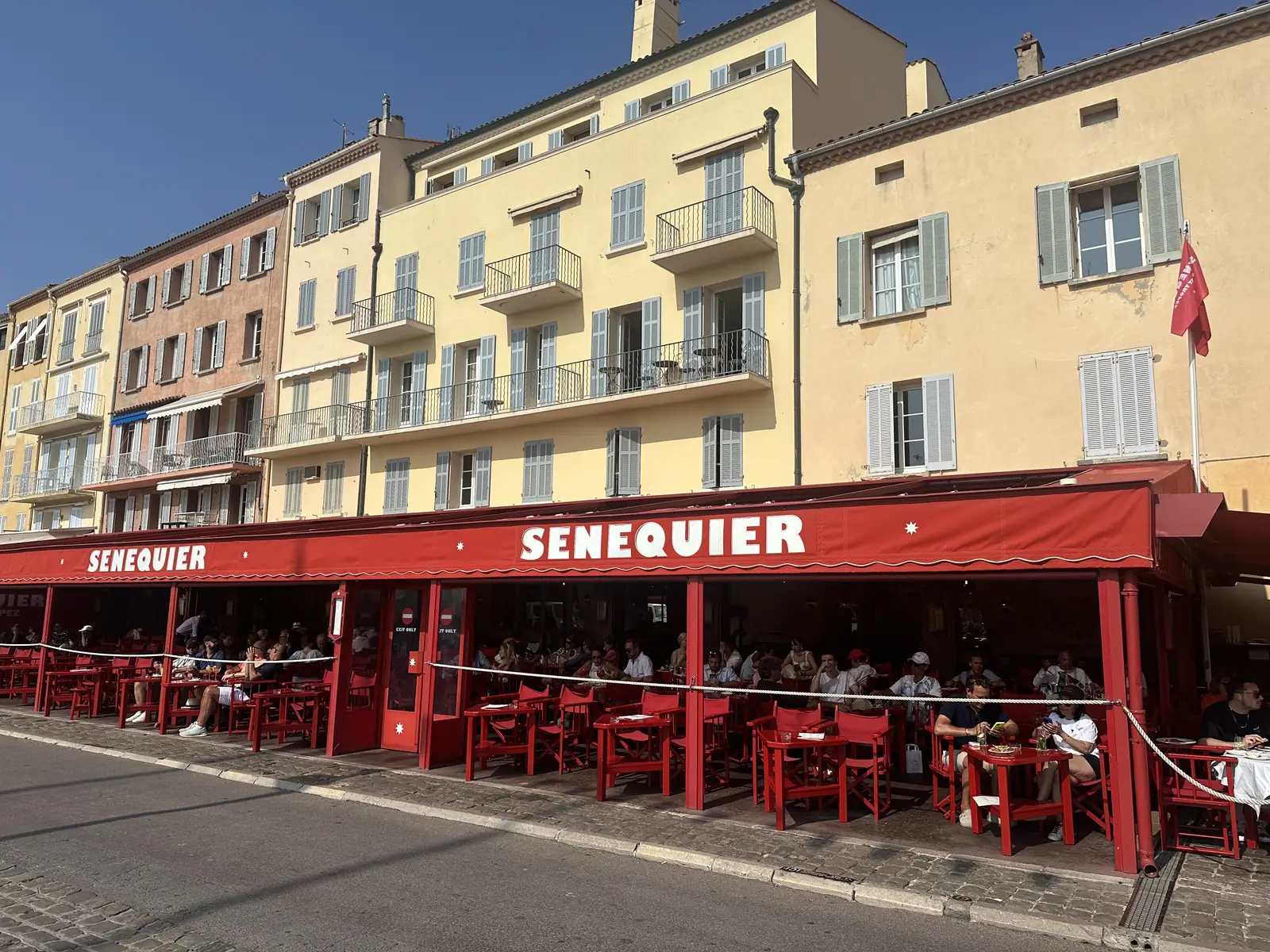 The red terrace of the Sénéquier café on the port of Saint-Tropez