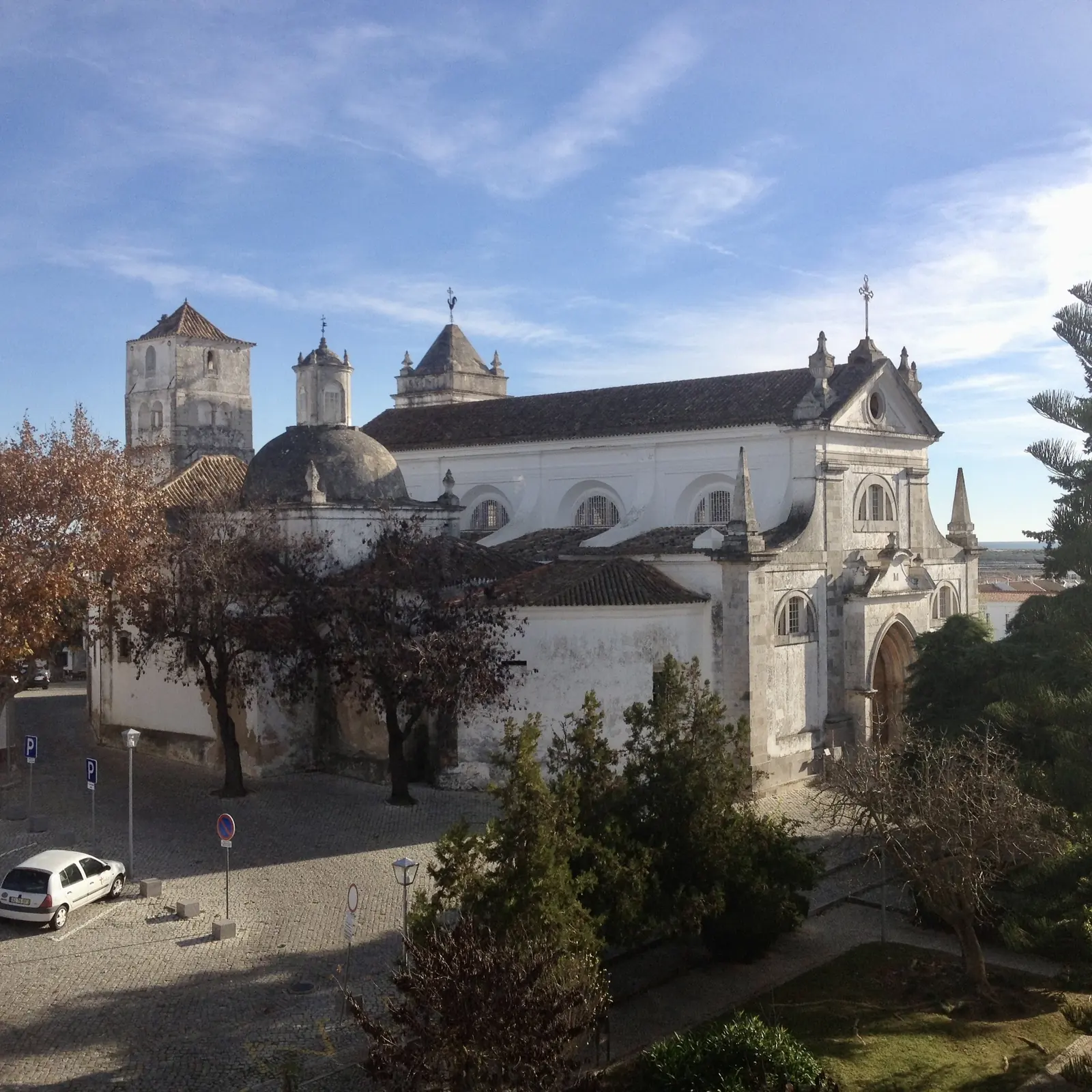 A church and the old town roofs of Tavira